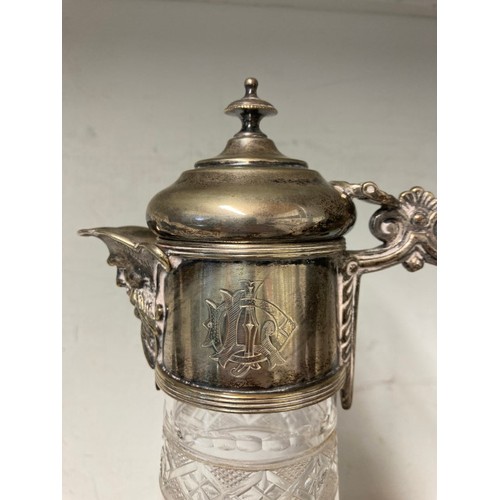 327 - Silver plated & cut crystal water pitcher with ice chamber & 19th century silver plated claret jug