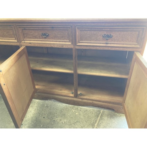 99 - Scrubbed pine 3 door/3 drawer sideboard 92H 168W 53D