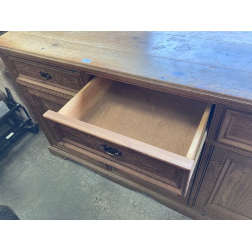 99 - Scrubbed pine 3 door/3 drawer sideboard 92H 168W 53D