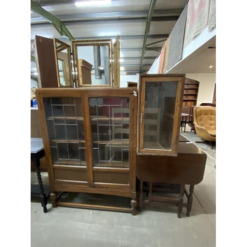 105 - Edwardian oak glazed bookcase 129H 91W 25D, an oak glazed cupboard 65H 33W 41D & an oak gate leg tab... 