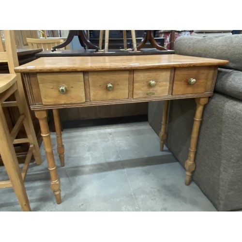 144 - Pine four drawer hall table 76H 88W 46D