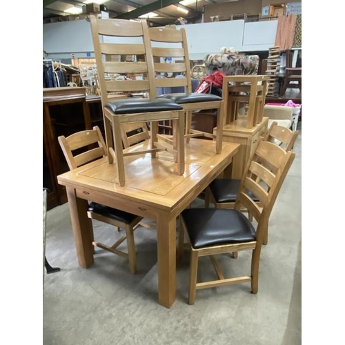 151 - Good quality oak draw leaf table 78H 141-221W 90D and 6 matching chairs