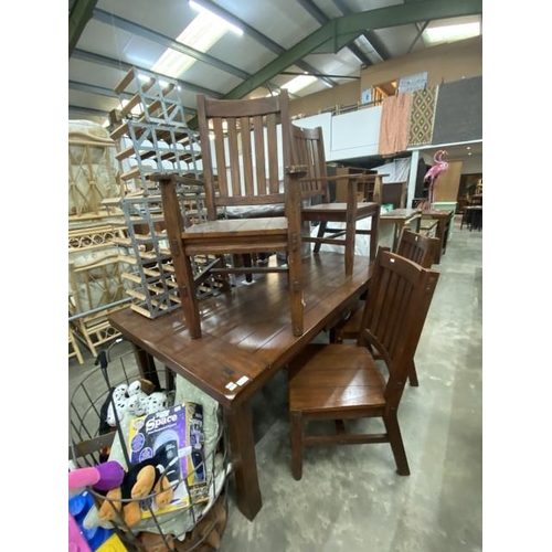 157 - Rustic stained pine dining table 80H 183W 101D and 6 matching chairs including 2 carvers (as found)