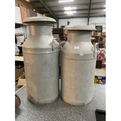 221 - 2 vintage aluminium milk churns (8 (stamped Healds Dairies & 10 gallon) both with removable lids