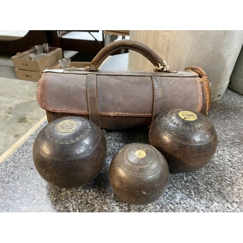 223 - Cased pair of wooden No. 3 lawn bowls & one Jack