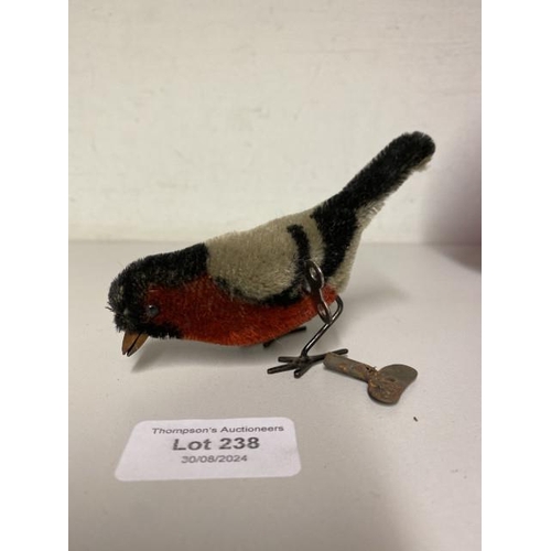 238 - 1920’s Schuco wind-up mohair pecking bird with two winders (in working order)