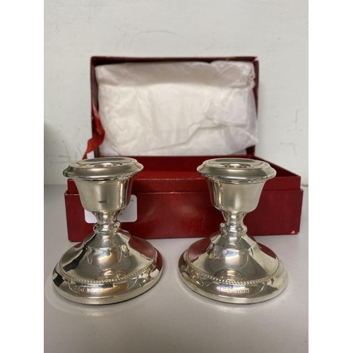 241 - Pair of Mappin & Webb Ltd, Birmingham 1971 silver candlesticks (190g) 7cm high (boxed)