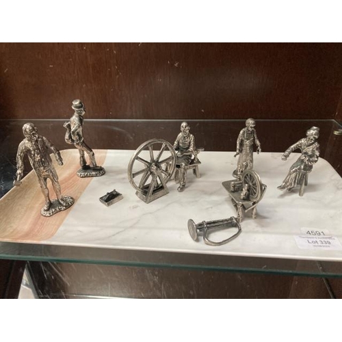 339 - Collection of base metal with silver finish figurines & accessories inc. Blacksmith