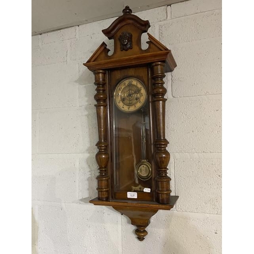 68 - Victorian mahogany Vienna clock with pendulum and key