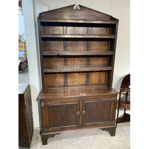 74 - Arts & Crafts oak open bookcase with wording from the poem ‘The Present Crisis’ by James Russell Low... 