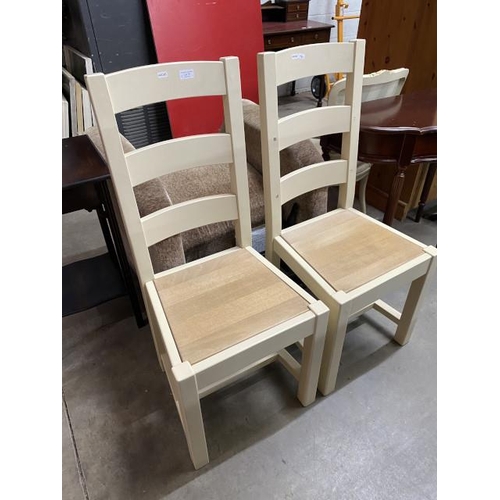 79 - Pair of cream ladder back kitchen chairs 45W