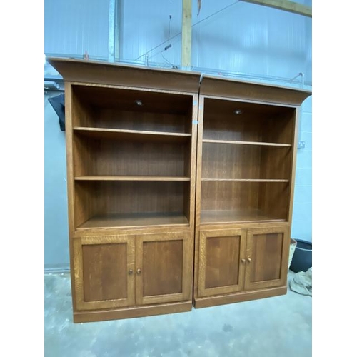 95 - Good quality oak bookcase on cupboard (in two sections) each unit 184H 99W 51D