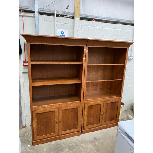 95 - Good quality oak bookcase on cupboard (in two sections) each unit 184H 99W 51D