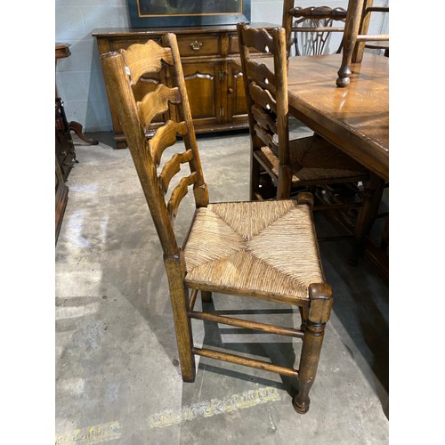 64 - Titchmarsh & Goodwin style oak refectory table 74H 183W 81D and 6 ladder-back chairs including 2 car... 