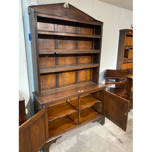 74 - Arts & Crafts oak open bookcase with wording from the poem ‘The Present Crisis’ by James Russell Low... 