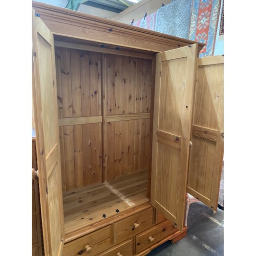 25 - Pine 3 door/5 drawer wardrobe 200H 140W 60D