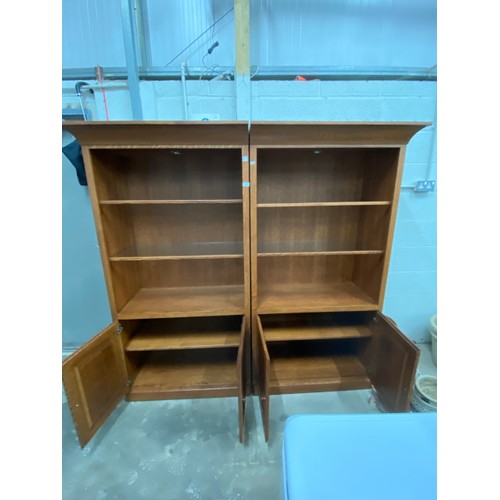 95 - Good quality oak bookcase on cupboard (in two sections) each unit 184H 99W 51D