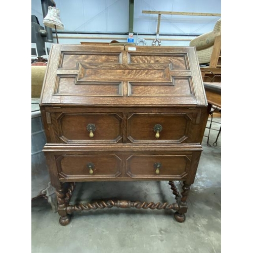 101 - Jacobean style oak bureau with one key 68H 77W 56D