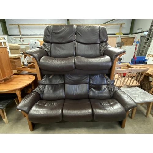 106 - 2 brown leather ‘Stressless’ settees 170W & 200W