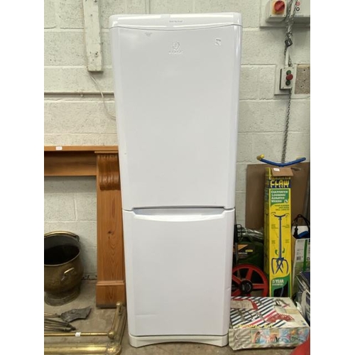 111 - Indesit fridge freezer 175H 60W 60D