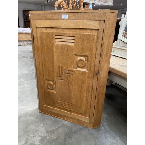 125 - Art Deco French oak corner cupboard (possibly by Charles Dudouyt) with one key 89H 64W 38D