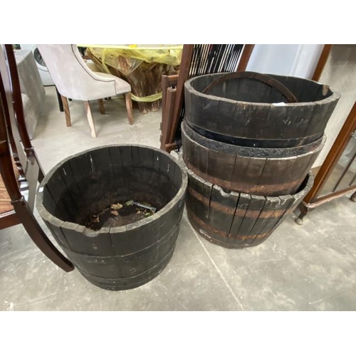 147 - 4 oak half barrel planters 45H 63cm diameter