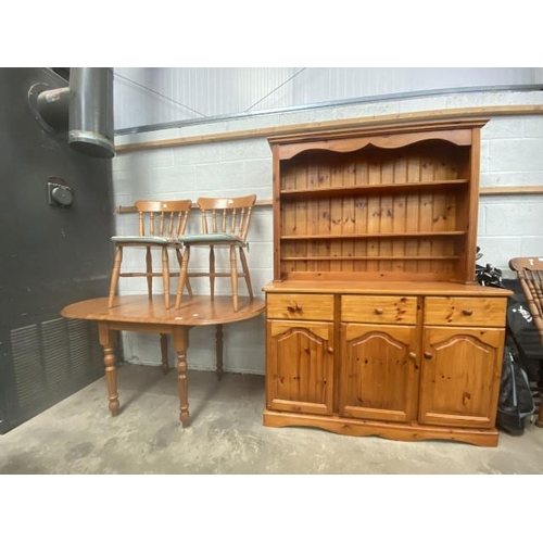 2 - Pine kitchen dresser188H 136W 46D & Pine extending  oval kitchen table 74H 79-152W 75D and 2 pine ch... 