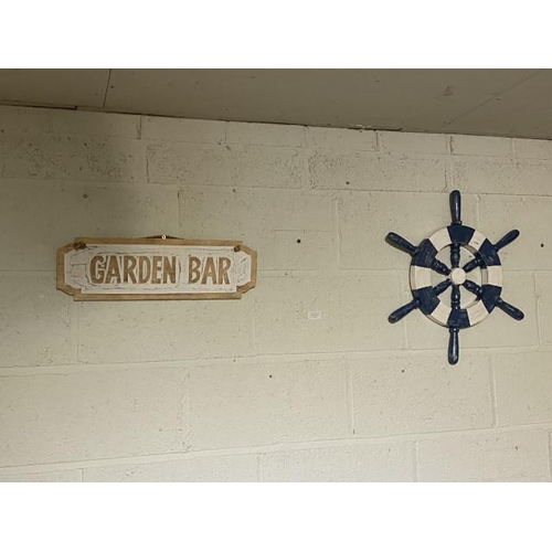 213 - ‘Garden Bar’ wooden sign 50 x 16cm & a nautical wooden ships wheel 50cm diameter