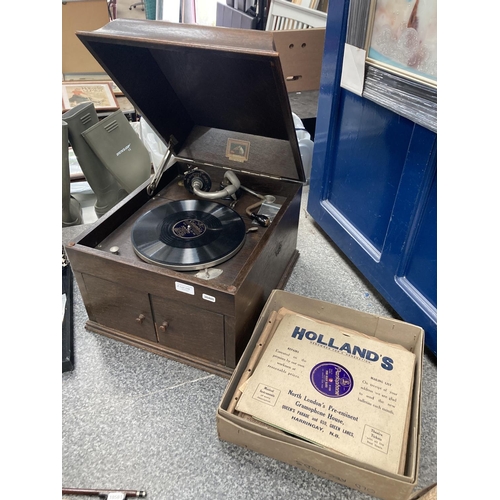 248 - Oak cased HMV table top gramophone (in working order)& a collection of 78's