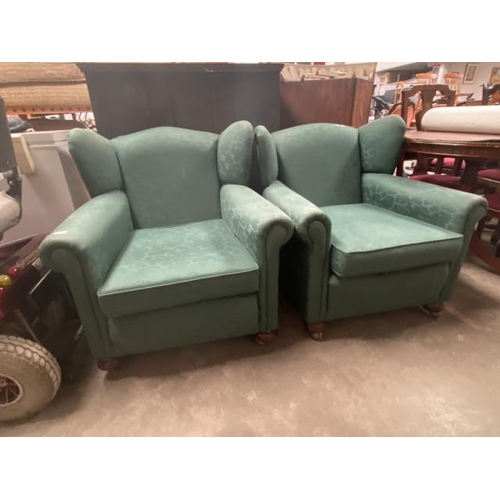 25 - 2 1920's turquoise upholstered armchairs 74W