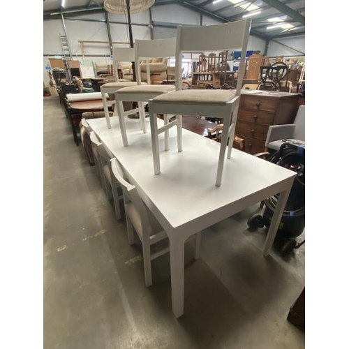 28 - Good quality white extendable dining table 76H 180W/240W 90D and six chairs