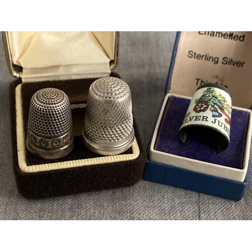 351 - Two silver thimbles and a silver & enamel thimble