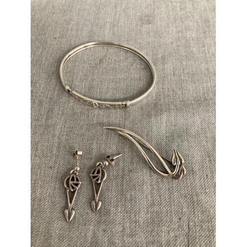 367 - Silver Times Past 'Rennie Mackintosh' hoop bangle, brooch and a pair of earrings