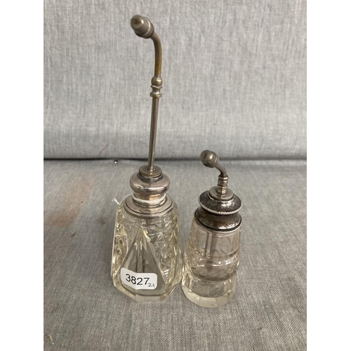 439 - Two silver topped glass scent bottles