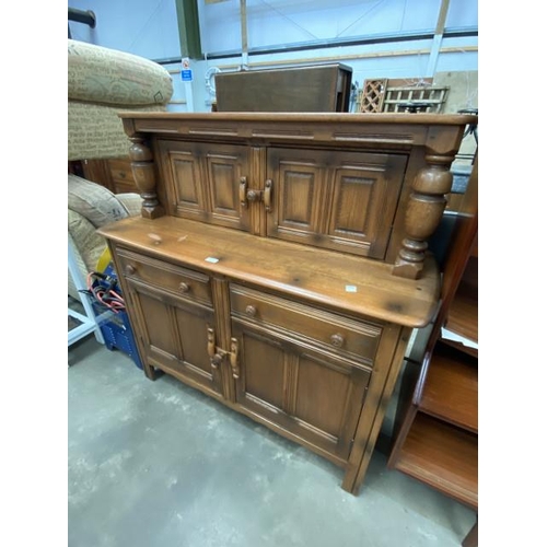 74 - Ercol elm Court cupboard 125H 123W 47D