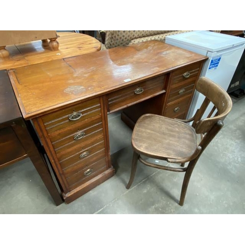 85 - Edwardian oak knee hole desk 79H 122W 56D and a Bentwood desk chair