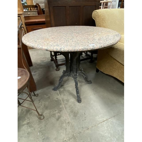 90 - Marble topped circular table with cast base 73H 90cm diameter