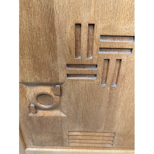 125 - Art Deco French oak corner cupboard (possibly by Charles Dudouyt) with one key 89H 64W 38D