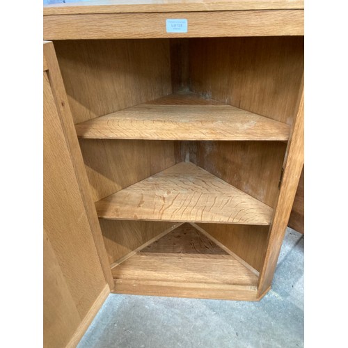 125 - Art Deco French oak corner cupboard (possibly by Charles Dudouyt) with one key 89H 64W 38D