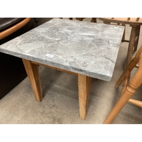 107 - Grey marble topped occasional table with tree root base 47H 60W 60D NEW