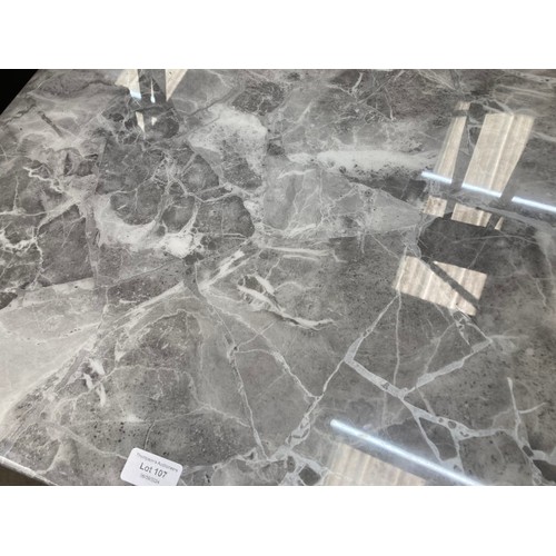 107 - Grey marble topped occasional table with tree root base 47H 60W 60D NEW