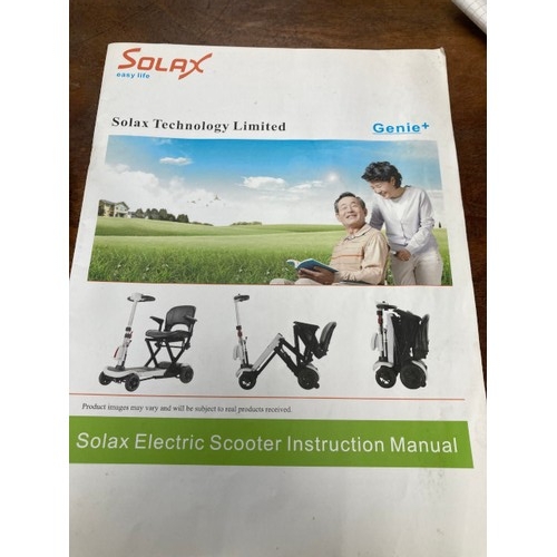 32 - Solax Genie + electric scooter with 2 keys, remote control and instructions (in working order)