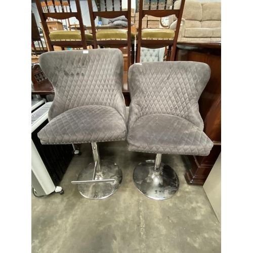 177 - 2 rise and fall grey upholstered Knocker bar stools 55W