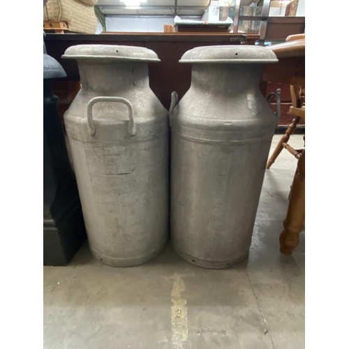 23 - 2 Swiftcan galvanised milk churns with lids 73H 34cm diameter