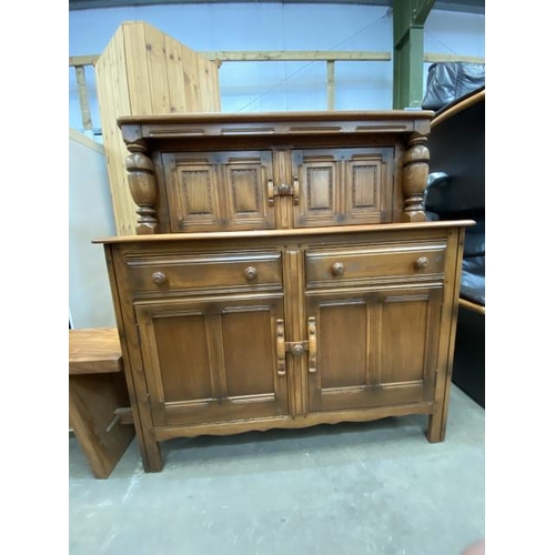 36 - Ercol elm Court cupboard 125H 123W 47D