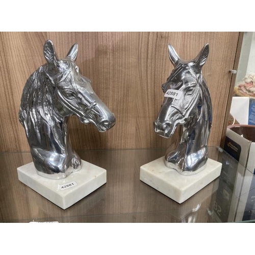 491 - Pair of chrome style horse head bookends