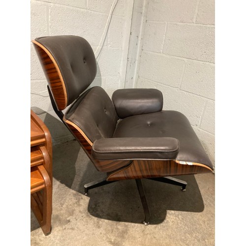 116 - Herman Miller 'Eames' style lounge chair 84H 86W 53D with a matching footstool 43H 65W 53D, upholste... 