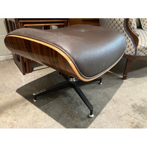 116 - Herman Miller 'Eames' style lounge chair 84H 86W 53D with a matching footstool 43H 65W 53D, upholste... 