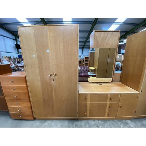 141 - Mid century ‘Meredew’ blond oak wardrobe, with hanging rail to the interior 176H 92W 53D and a match... 