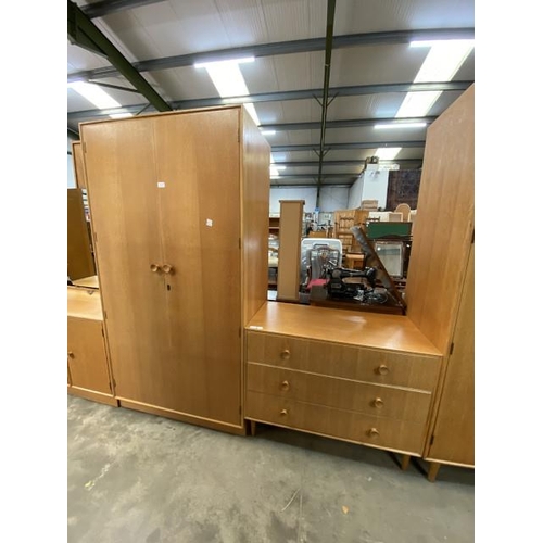 142 - Mid century ‘Meredew’ blond oak wardrobe, with hanging rail to the interior 176H 92W 53D and a match... 